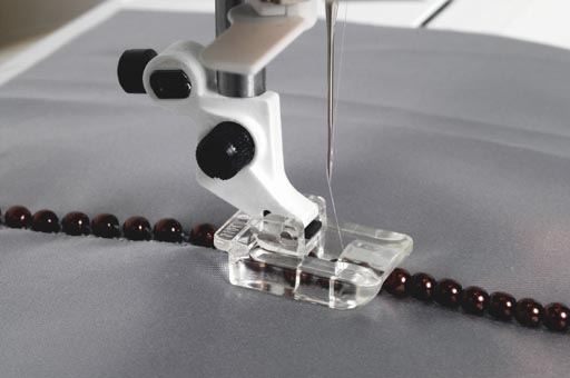 Pied mini pour sequins 4mm Husqvarna