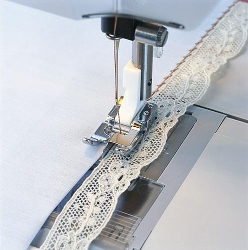 Pied pour surpiqûres près du bord Husqvarna