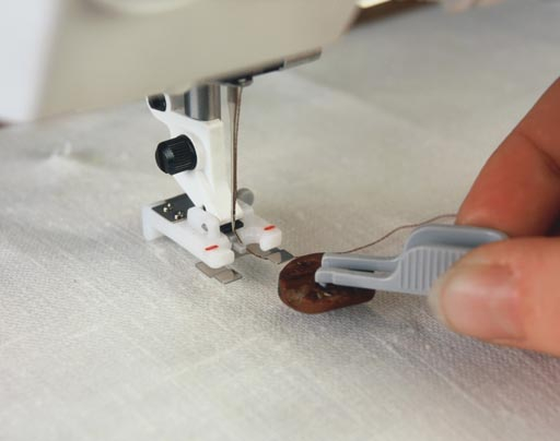 Pied pour pose précise de bouton Husqvarna