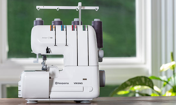 Surjeteuse HUSQVARNA Amber S100 + set de démarrage n°1 offert